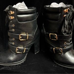 New pair of black ankle boots with heels. Size 8.5